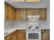 Kitchen showcasing a white countertop and range at 811 Pebblewood Dr, Brandon, FL 33511