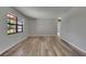 Inviting living room filled with natural light and showcasing modern flooring at 811 Pebblewood Dr, Brandon, FL 33511