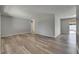 Bright, open-concept living room boasts continuous flooring and ample natural light at 811 Pebblewood Dr, Brandon, FL 33511