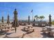 Outdoor grilling area with stainless steel grills overlooking the bay, ideal for entertaining at 868 Bayway Blvd # 206, Clearwater Beach, FL 33767