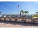 Bayfront grilling area with modern stainless steel grills, perfect for outdoor cooking with a view at 868 Bayway Blvd # 206, Clearwater Beach, FL 33767
