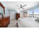 Bright bedroom featuring water views, ample closet space, and beachy decor at 868 Bayway Blvd # 206, Clearwater Beach, FL 33767