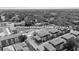 Aerial view of new townhomes offers a glimpse of the community and modern design from above at 8723 Palm Ranches Pl, Tampa, FL 33614