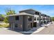 Contemporary townhome showcasing a minimalist design with a neutral color palette and well-maintained surroundings in a residential area at 8723 Palm Ranches Pl, Tampa, FL 33614