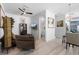 Bright, contemporary living room with modern furnishings and stylish decor at 8723 Palm Ranches Pl, Tampa, FL 33614