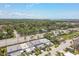 Aerial view of lush green landscaping surrounding the building at 93 Boca Ciega Point N Blvd # 93, St Petersburg, FL 33708