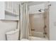Cozy bathroom includes a bathtub with shower and vanity cabinet storage at 93 Boca Ciega Point N Blvd # 93, St Petersburg, FL 33708