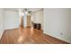 Spacious bedroom with wood-look floors, desk, and ceiling fan at 93 Boca Ciega Point N Blvd # 93, St Petersburg, FL 33708