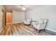 This room features two accent chairs, wood-look flooring, and a ceiling fan at 93 Boca Ciega Point N Blvd # 93, St Petersburg, FL 33708