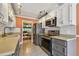 Well-maintained kitchen with stainless steel appliances and backyard view at 93 Boca Ciega Point N Blvd # 93, St Petersburg, FL 33708
