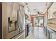 Updated kitchen featuring stainless steel refrigerator and bright lighting at 93 Boca Ciega Point N Blvd # 93, St Petersburg, FL 33708