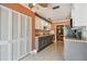 The kitchen has stainless appliances, and a tile backsplash at 93 Boca Ciega Point N Blvd # 93, St Petersburg, FL 33708