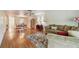 Spacious living room offering hardwood floors, natural light, and comfortable seating arrangements at 93 Boca Ciega Point N Blvd # 93, St Petersburg, FL 33708