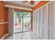 Cozy room with sliding glass doors leading to a private patio at 93 Boca Ciega Point N Blvd # 93, St Petersburg, FL 33708