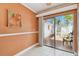 Bright living space with sliding glass doors to an outdoor patio at 93 Boca Ciega Point N Blvd # 93, St Petersburg, FL 33708