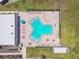 Aerial view of a unique Y-shaped pool with ample lounging space and seating at 93 Boca Ciega Point N Blvd # 93, St Petersburg, FL 33708