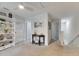Loft features a ceiling fan, neutral carpet, and ample natural light at 9665 Sweetwell Pl, Riverview, FL 33569