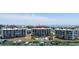 Multi-story condominiums overlooking boat docks, the inter coastal, and a community pool at 9815 Harrell Ave # 503, Treasure Island, FL 33706