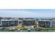 Aerial view of the waterfront complex with boat docks and easy access to the ocean at 9815 Harrell Ave # 503, Treasure Island, FL 33706