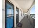 Private balcony access with scenic views, complemented by exterior architectural details at 9815 Harrell Ave # 503, Treasure Island, FL 33706