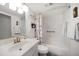Cozy bathroom featuring a shower and tub combination, alongside a functional sink and vanity at 9815 Harrell Ave # 503, Treasure Island, FL 33706