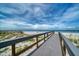 Treasure Island Florida beach access over boardwalk to white sandy beach at 9815 Harrell Ave # 503, Treasure Island, FL 33706