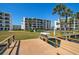 Waterfront property with grass yard, boat dock, buildings and beach access in Treasure Island Florida at 9815 Harrell Ave # 503, Treasure Island, FL 33706