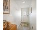 Inviting entry hallway with decor, wood flooring, and a front door with a decorative window at 9815 Harrell Ave # 503, Treasure Island, FL 33706