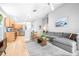 Open-concept living space seamlessly connects to the kitchen, offering a bright and airy atmosphere at 10357 Lightner Bridge Dr, Tampa, FL 33626