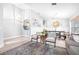 Open-concept living space with natural light, modern furnishings, and seamless flow for entertaining at 10357 Lightner Bridge Dr, Tampa, FL 33626