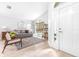 Bright and airy living room featuring hardwood floors, large windows, and a comfortable seating area at 10357 Lightner Bridge Dr, Tampa, FL 33626