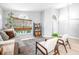 Inviting living room with plenty of natural light, neutral decor, and comfortable seating arrangement at 10357 Lightner Bridge Dr, Tampa, FL 33626