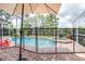 This home's pool is screened-in and fenced for safety and privacy at 10357 Lightner Bridge Dr, Tampa, FL 33626
