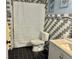 Modern bathroom with a new shower, patterned tile, updated fixtures, and a sleek design at 10607 Boyette Creek Blvd, Riverview, FL 33569