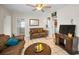 Open living area with tile flooring, comfortable seating, and convenient access to other parts of the home at 1101 Essex N Dr, St Petersburg, FL 33710