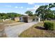 Charming home with covered parking and a well-maintained yard at 1108 E Annie St, Tampa, FL 33612