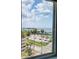 Breathtaking water views seen from the home's window overlooking palm trees and the harbor at 1120 N Shore Ne Dr # 804, St Petersburg, FL 33701