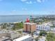 An aerial view of the condo building in a vibrant coastal setting near the beach at 1120 N Shore Ne Dr # 804, St Petersburg, FL 33701
