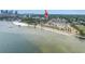 A distant aerial view shows the building located near the beach and waterfront at 1120 N Shore Ne Dr # 804, St Petersburg, FL 33701