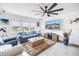 Bright living room with a large window view, comfortable seating, modern decor, and tiled floors at 1120 N Shore Ne Dr # 804, St Petersburg, FL 33701