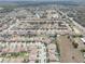 A high-angle shot of a housing development that includes lawns and several cul-de-sac streets at 11222 Hawks Fern Dr, Riverview, FL 33569