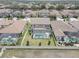Aerial shot of the home, fenced yard, pool, and community at 11222 Hawks Fern Dr, Riverview, FL 33569