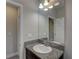 Bathroom featuring a granite countertop and an elegant sink at 11222 Hawks Fern Dr, Riverview, FL 33569