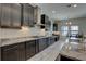 Modern kitchen boasts granite countertops, stainless steel appliances, and ample cabinet space at 11222 Hawks Fern Dr, Riverview, FL 33569
