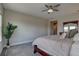 Serene main bedroom with neutral tones, providing a tranquil retreat at 11222 Hawks Fern Dr, Riverview, FL 33569