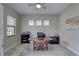 Bright and airy office featuring tile floors, natural light, and a neutral color palette at 11222 Hawks Fern Dr, Riverview, FL 33569