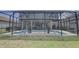 Screened-in pool, patio, and an outdoor dining area for summer entertainment at 11222 Hawks Fern Dr, Riverview, FL 33569