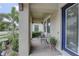 Inviting front porch with paver flooring and lush greenery offering curb appeal at 11222 Hawks Fern Dr, Riverview, FL 33569