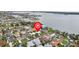 Stunning aerial view of the waterfront neighborhood showcasing nearby bays and beautiful surroundings at 113 16Th St, Belleair Beach, FL 33786