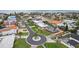 Scenic aerial view of the neighborhood highlighting lush landscaping, cul-de-sac street and nearby community at 113 16Th St, Belleair Beach, FL 33786